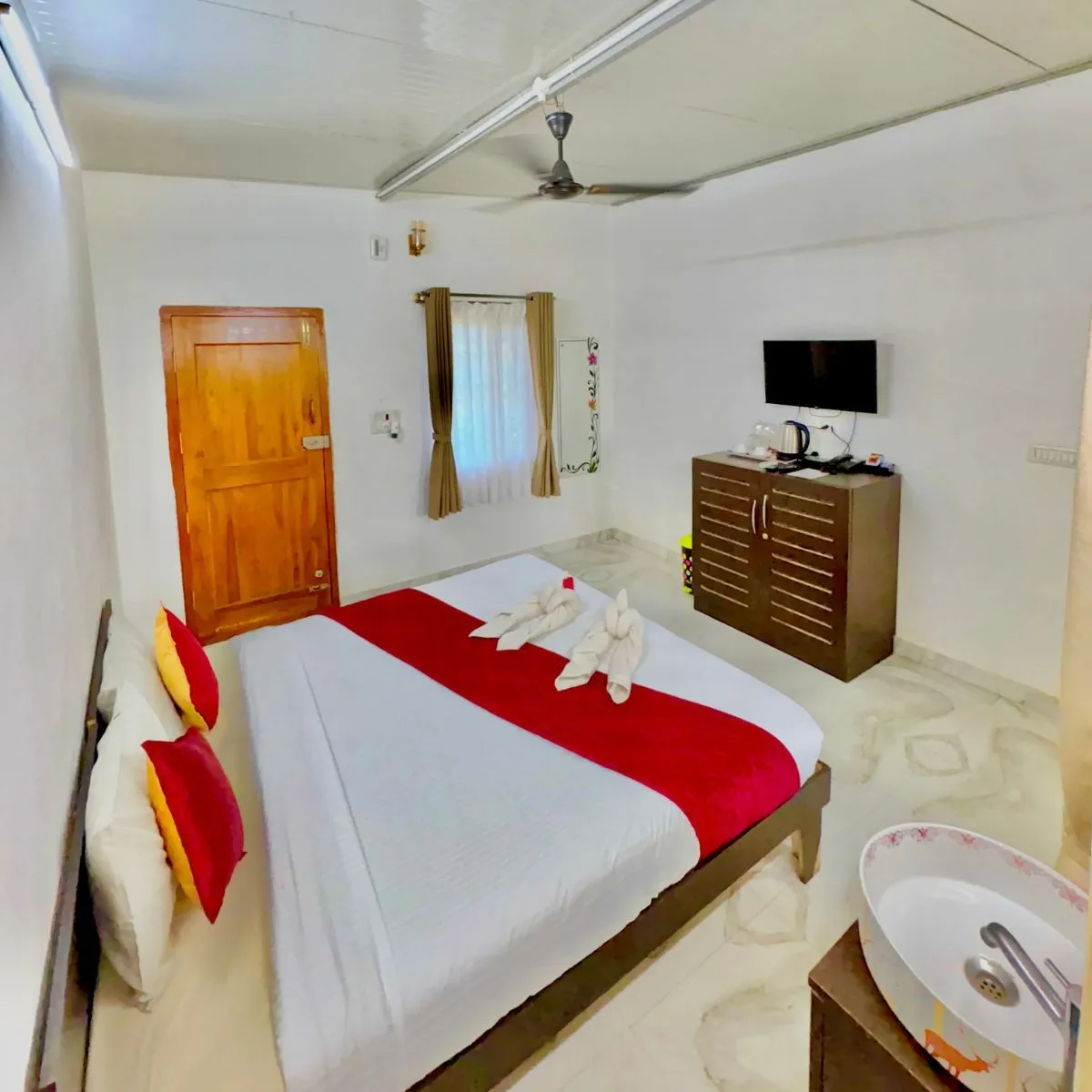 Bird Lounge room interior with bed and wooden furniture