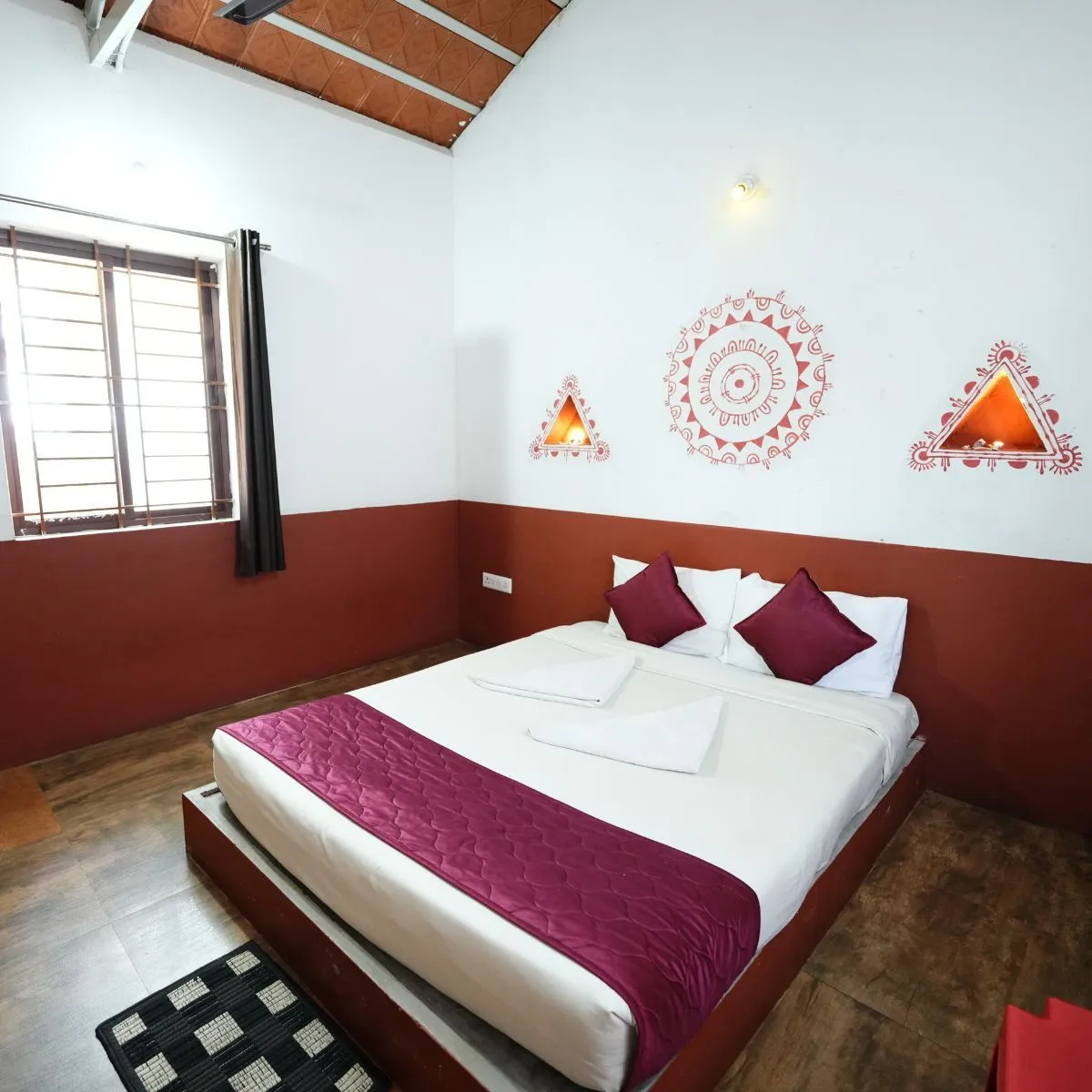 Couple hut bed with side window and warm lighting